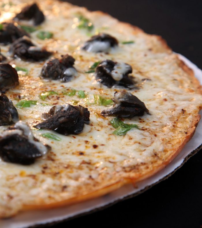 Món Pizza được chế biến từ ốc sên